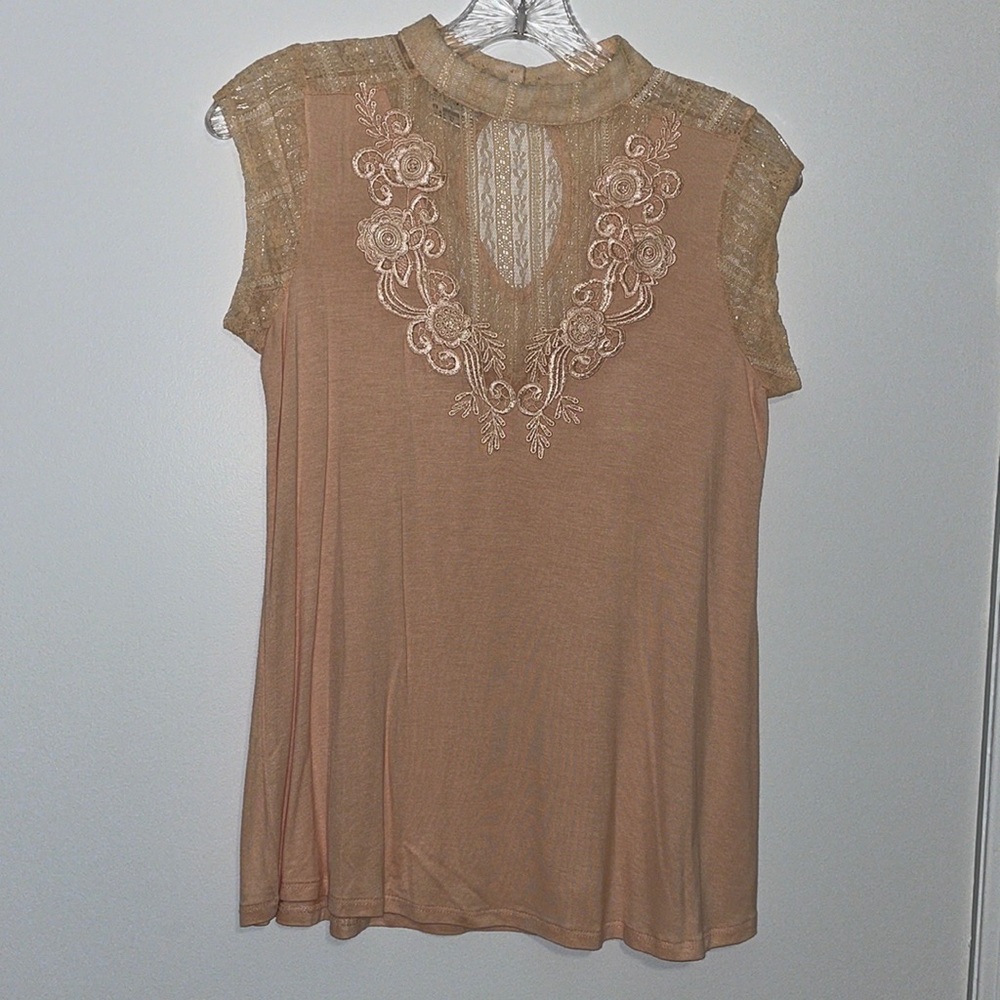 Peach colored top with lace detail size: xs